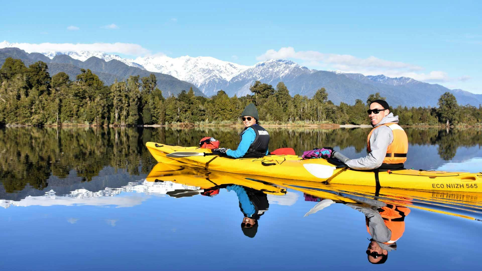 People tandem kayaking at Franz Josef