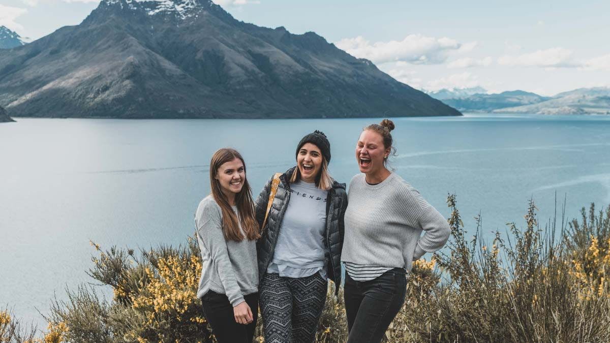 Group of friends posing for a photo in New Zealand