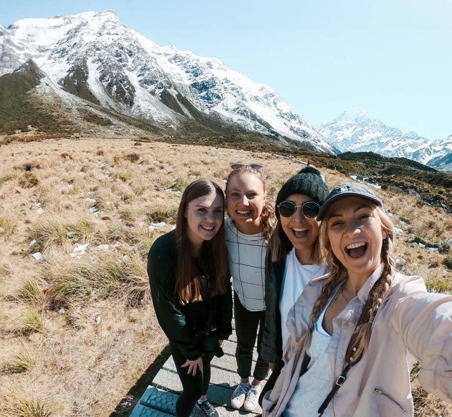 Four women posing for a selfie in New Zealand